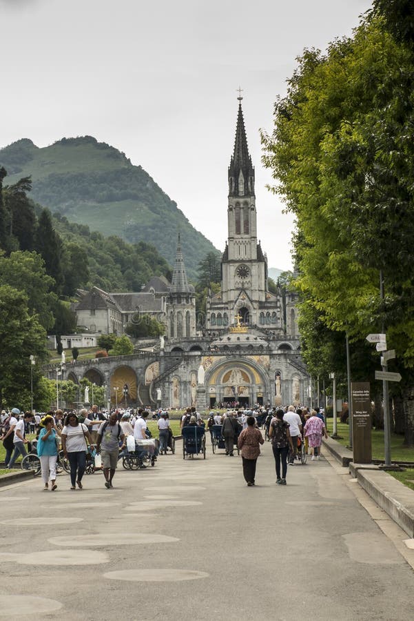 Lourdes, France June 24, 2019: Volunteers Helping the Sick Get To the ...