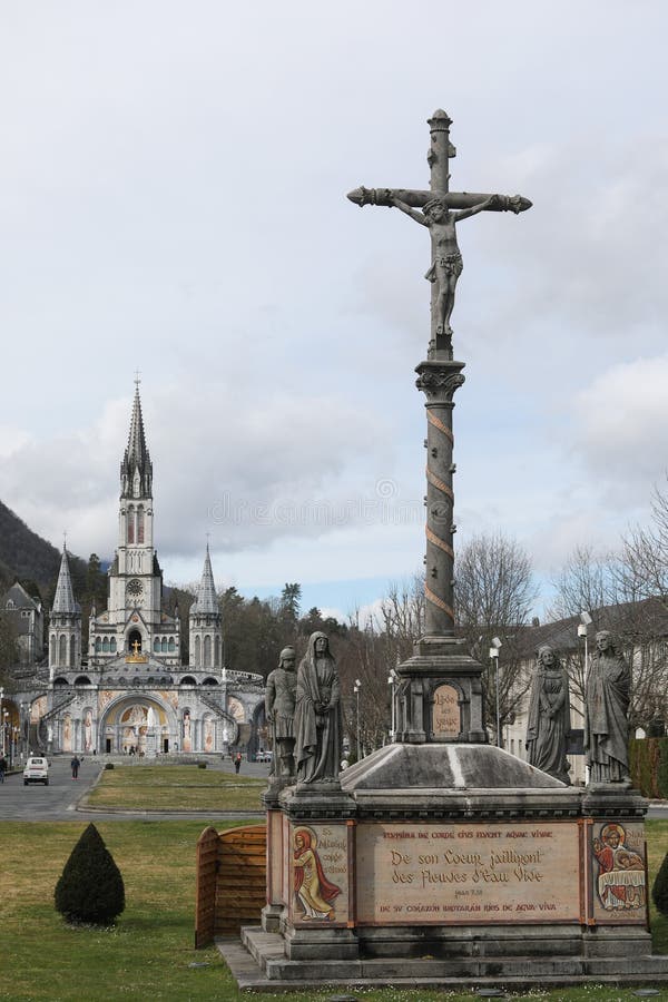 Sculpture Catholic Cross Against the Background of the Lourdes ...