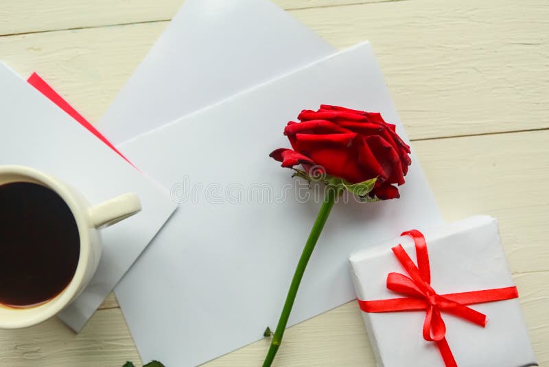 Red Rose, Coffee Cup and Gift Box on Wooden Table Stock Image Image
