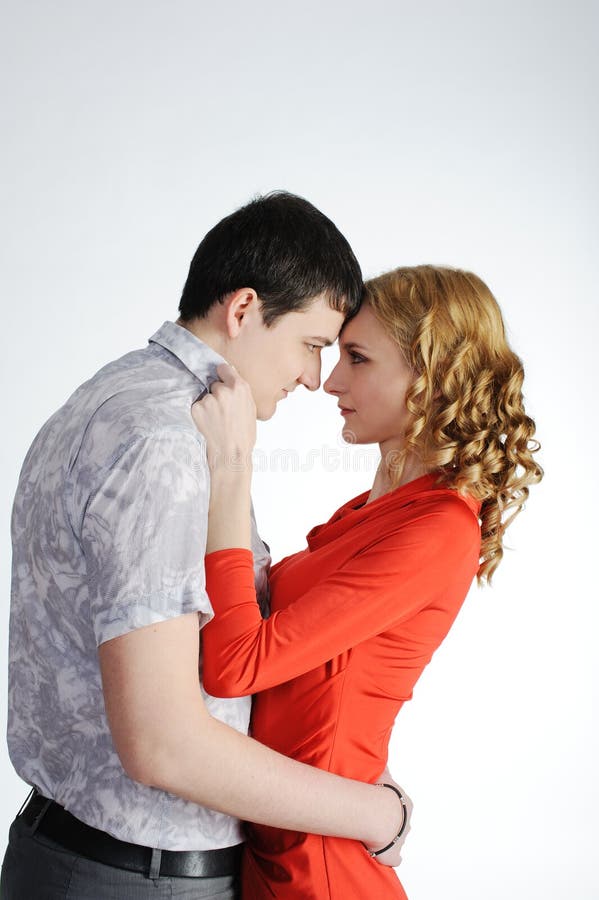 Love couple of young women and men hug each other