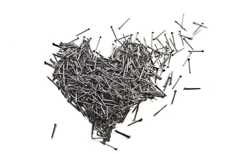 Love heart made of iron nails royalty free stock photography