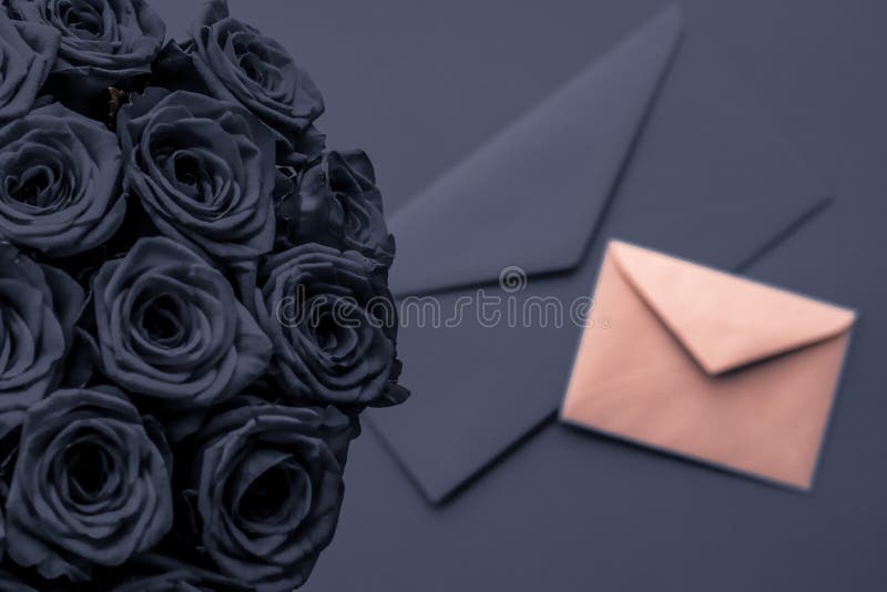 Love letter and flowers delivery on Valentines Day, luxury bouquet of roses and card on charcoal background for romantic holiday stock photos Love letter and flowers delivery on Valentines Day, luxury bouquet of roses and card on charcoal background for romantic holiday stock photos