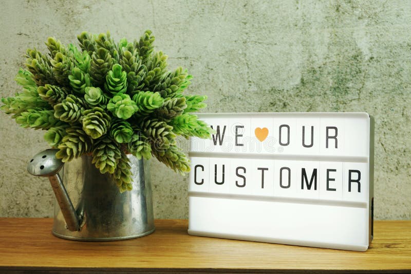 We love our customer word in light box business concept background stock images