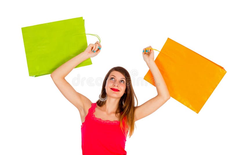 Satisfied woman after shopping with shopping bags - isolated on white. Satisfied woman after shopping with shopping bags - isolated on white.