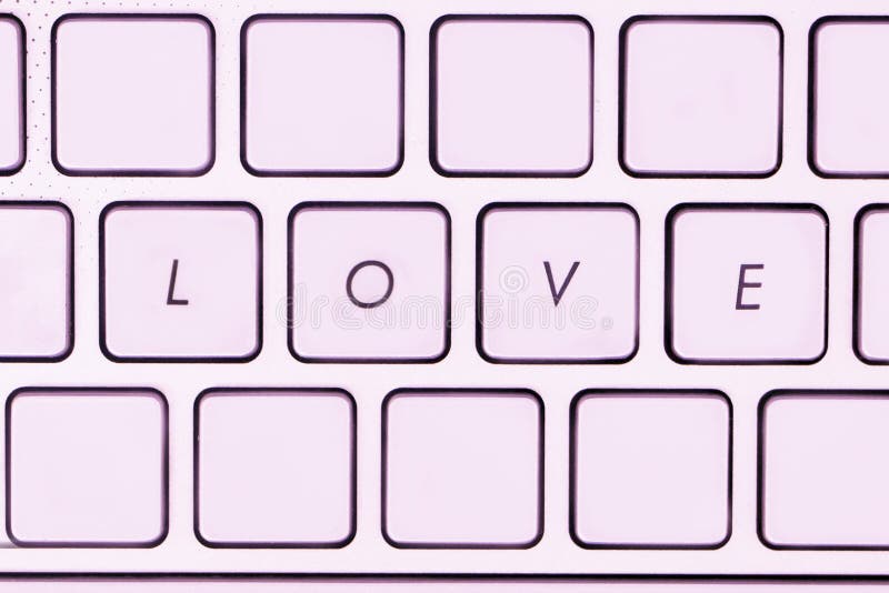 Love text on computer keyboard.concepts of online dating stock image Love text on computer keyboard.concepts of online dating stock image