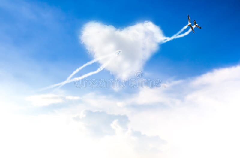 Love is in the two bird flying blue sky stock photos Love is in the two bird flying blue sky stock photos