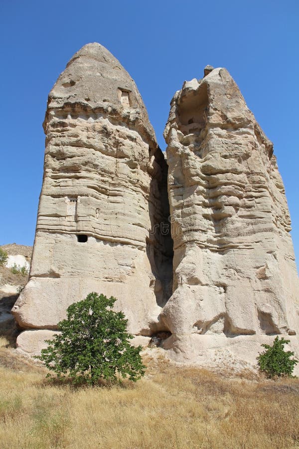 Love valley in Goreme village, Turkey. Rural Cappadocia landscape. Stone houses in Goreme, Cappadocia. royalty free stock photography Love valley in Goreme village, Turkey. Rural Cappadocia landscape. Stone houses in Goreme, Cappadocia. royalty free stock photography