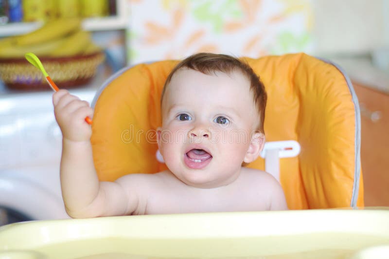 Lovely Baby Age 10 Months Spoon Stock Photos Free & RoyaltyFree
