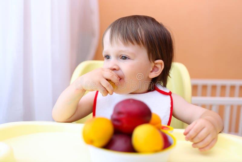Lovely Baby Eating Peaches and Apricotes Stock Photo Image of lovely