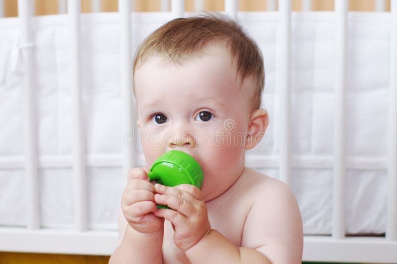 Lovely baby with nibbler stock image. Image of month 36254809