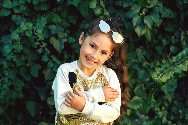 Lovely baby with sunglasses . Little girl on a summer walk royalty free stock image Lovely baby with sunglasses . Little girl on a summer walk royalty free stock image