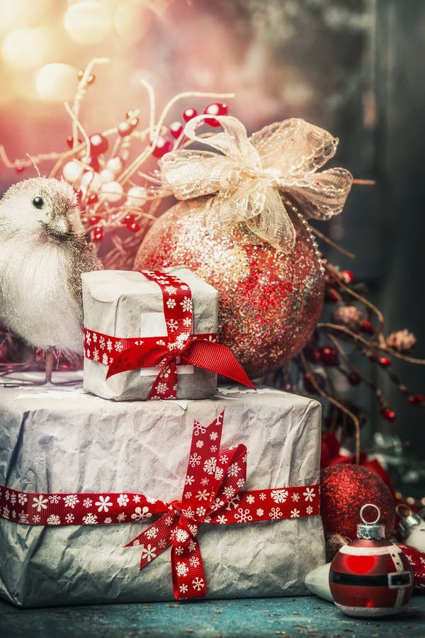 Lovely Christmas card with handmade gifts, bird, holiday ball ,decoration and bokeh lighting, vintage stock image Lovely Christmas card with handmade gifts, bird, holiday ball ,decoration and bokeh lighting, vintage stock image