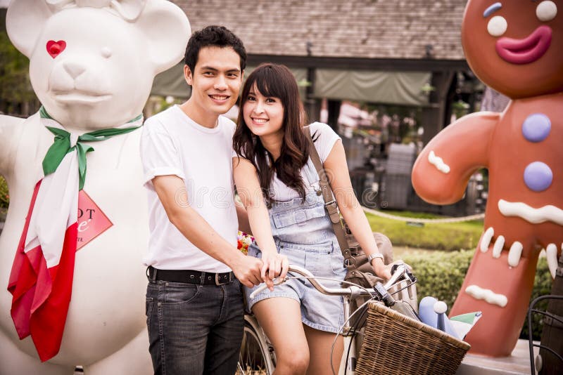 Lovely couple in the amusement park