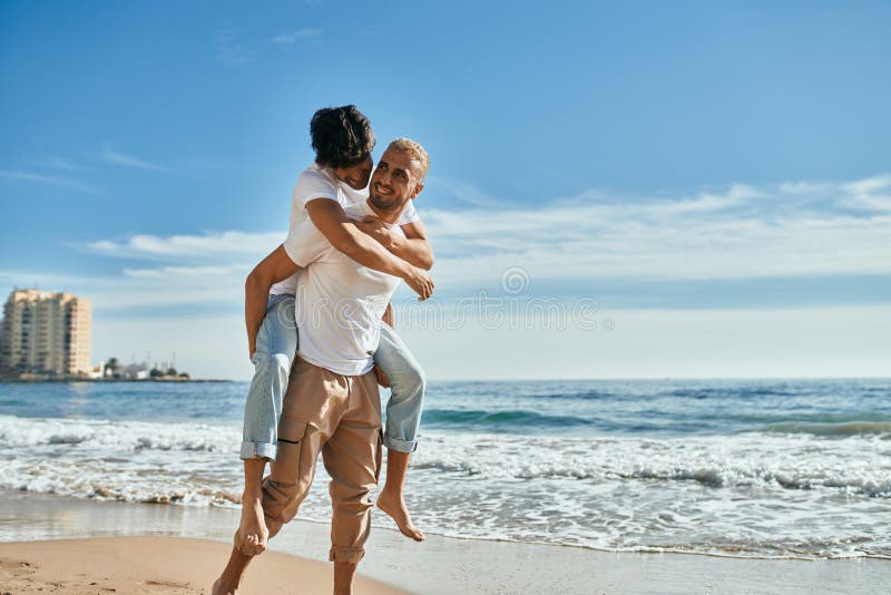 Lovely Gay Couple On Piggyback Ride Stock Photo 1892144086