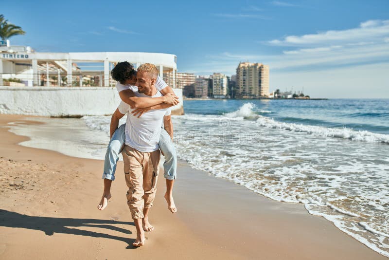 Lovely Gay Couple On Piggyback Ride Stock Photo 1892144086