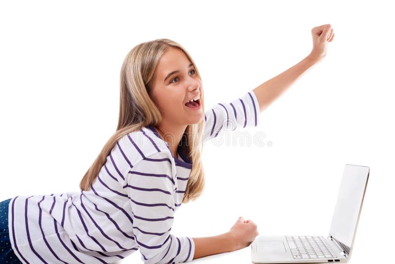 Lovely girl laying on the floor using laptop and celebrating victory,isolated