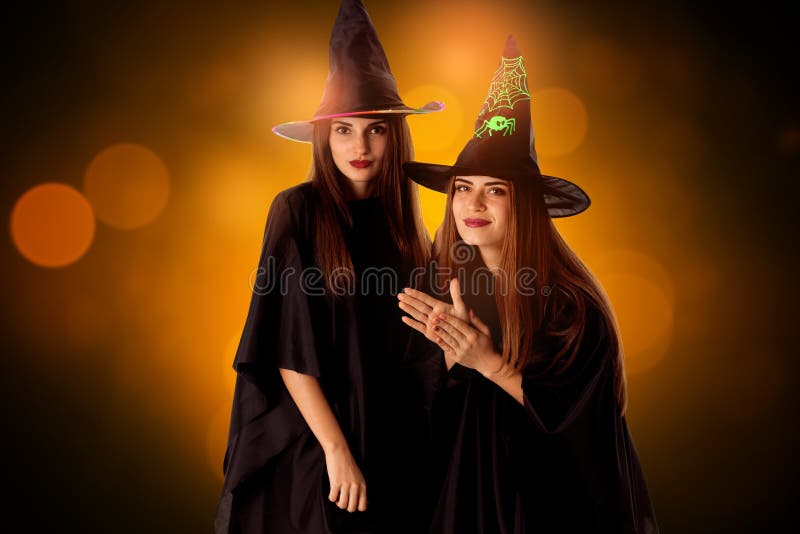 Lovely girls in halloween style stock photo