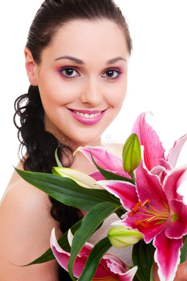 Lovely woman with bunch of flowers