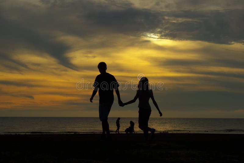 Lovers Walk On Beach Picture. Image 4101253