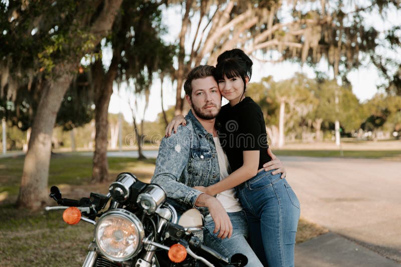 Loving Adorable Portrait of two Attractive Good Looking Young Adult Modern Fashionable People Guy Girl Couple Kissing and Hugging stock images Loving Adorable Portrait of two Attractive Good Looking Young Adult Modern Fashionable People Guy Girl Couple Kissing and Hugging stock images