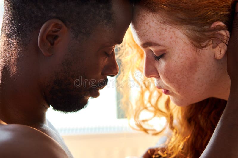 Loving Affectionate Nude Interracial Couple on Bed, Going To Kiss Stock  Image - Image of care, passion: 200033085
