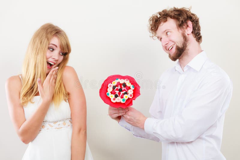 Loving Couple With Candy Bunch Flowers Love Stock Image Image Of 