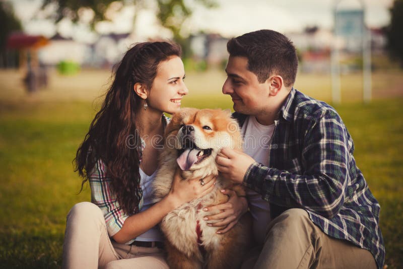 Loving couple and dog stock image. Image of caring, caucasian - 66091347