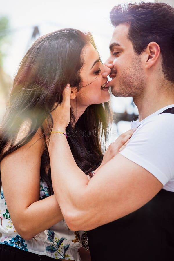 Biting kisses. Two people kissing Deep. Athletic girl kissing boyfriend.