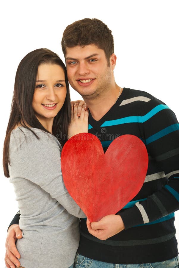 Loving couple holding heart shape