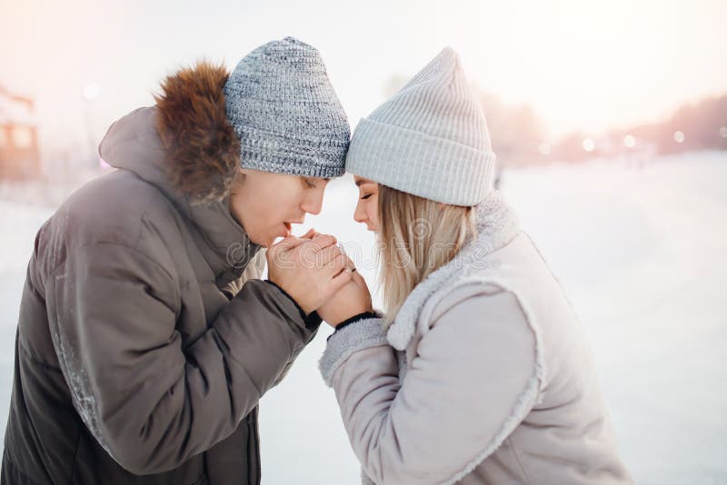 Loving Couple Man and Girl Warm Each Other Hands in Cold in Winter, Concept  Help and Support Family Relationships Stock Image - Image of people, happy:  170219411
