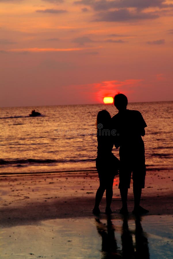 Loving couple at sunset