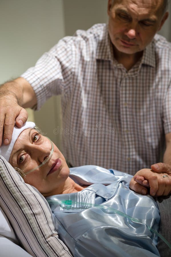 Loving husband taking care of sick wife