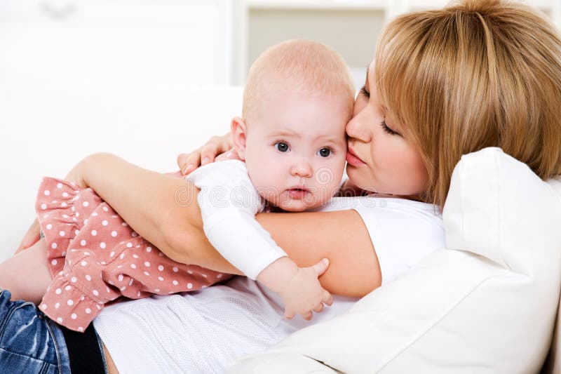 Loving mother her newborn baby