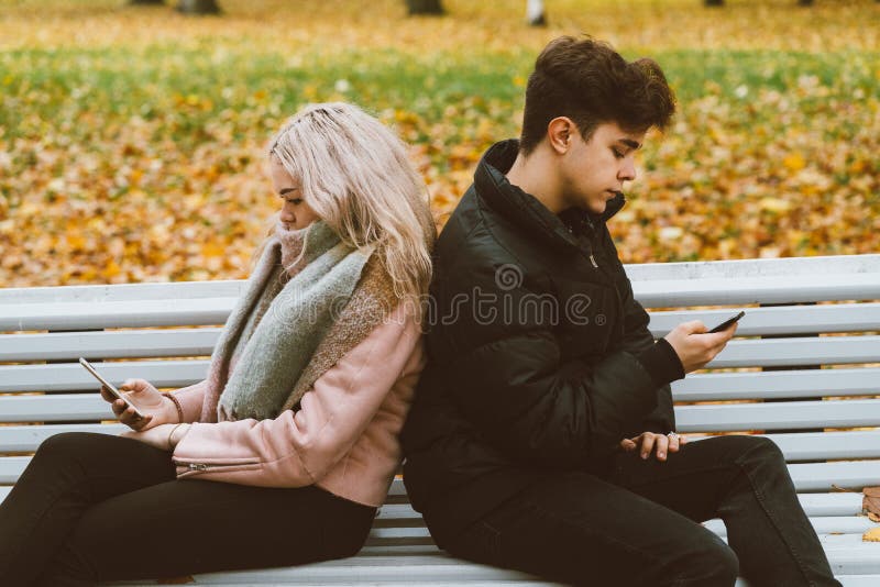 The boy looks tenderly at girl and wants to kiss. Concept of teenage love  and first kiss 7542624 Stock Photo at Vecteezy