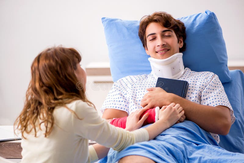 The Loving Wife Looking after Injured Husband in Hospital Stock Image ... pic
