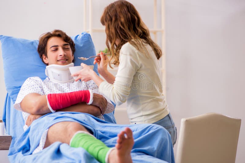 The Loving Wife Looking after Injured Husband in Hospital Stock Image ... image