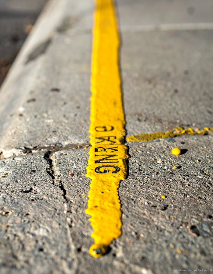 Close-up of a Yellow Parking Line on Concrete stock illustration