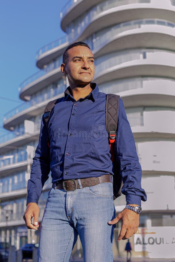 Low Angle Portrait of Young Latino Man in a City Stock Photo - Image of ...