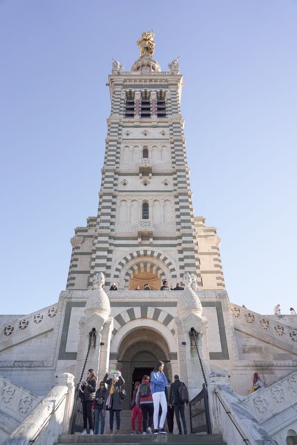 Low-angle shot of the cathedral of Notre Dame de lagarde in Marseille, France against the blue sky