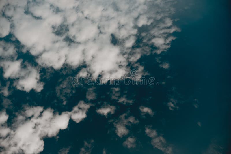 Low Angle Shot Of Clouds In A Dark Blue Sky Stock Image Image Of