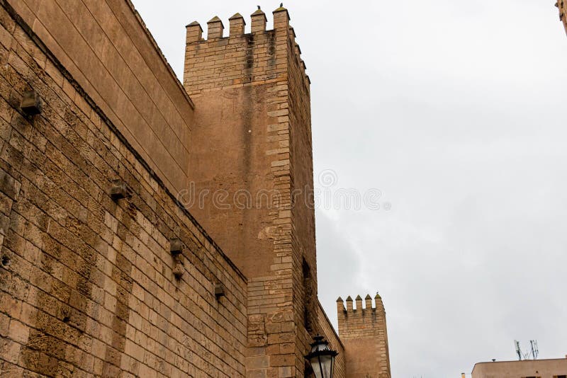Low angle shot of the facade of the gothic style Palm Cathedral under the clouds royalty free stock images