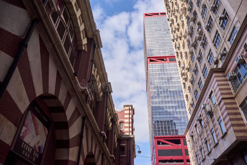 Low Angle Shot of Modern Buildings Against a Blue Sky in Shun Tak