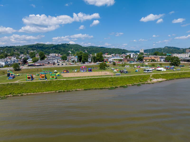 Lowangle of Sunlit Newport Cityscape from a River and Sunlit Cloudy