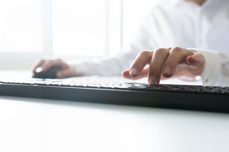 Low angle view of business programmer working stock photo