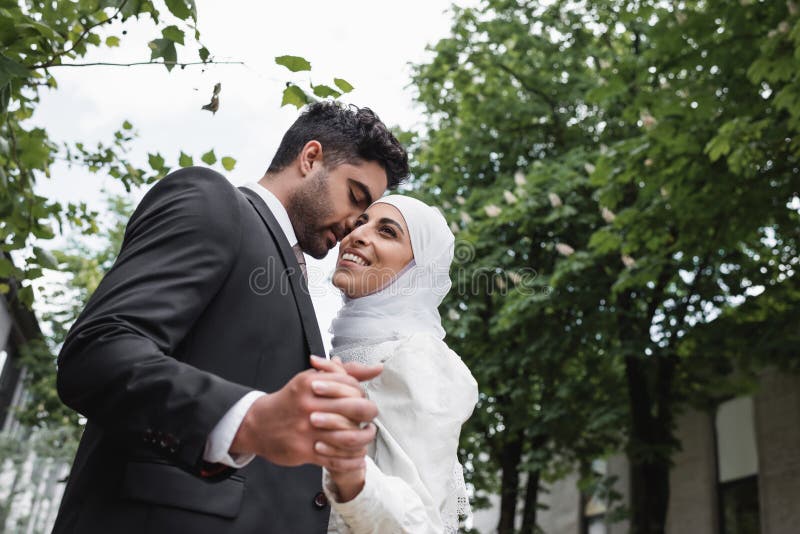 low angle view of happy muslim