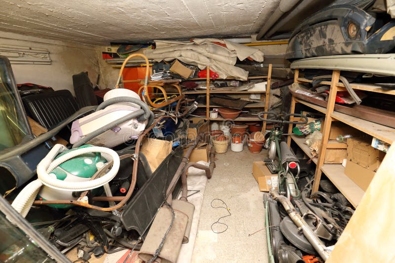 Low cellar full of trash, old vacuum cleaners royalty free stock photography Low cellar full of trash, old vacuum cleaners royalty free stock photography
