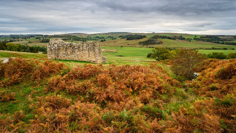 The ruins of an early 17th century bastle or defensible farmhouse in the Anglo-Scottish Borders as protection against Border Reivers. The ruins of an early 17th century bastle or defensible farmhouse in the Anglo-Scottish Borders as protection against Border Reivers