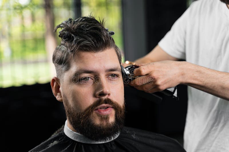 Low Fade Machine Haircut For Handsome Bearded Man In Barbershop. Hair Cut  With A Smooth Transition. Stock Image - Image Of Person, Style: 222309067