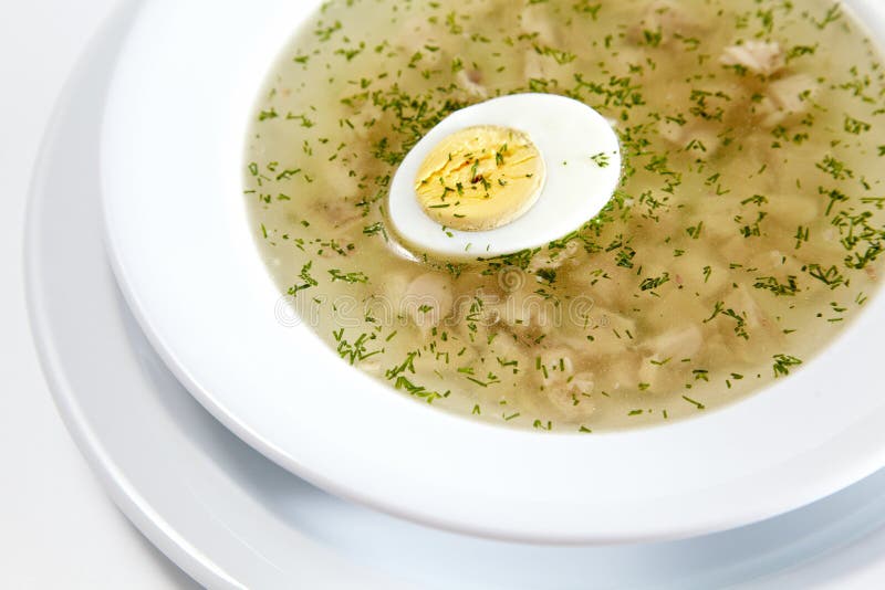Low-fat Chicken Broth With A Half Cooked Egg Stock Image - Image of