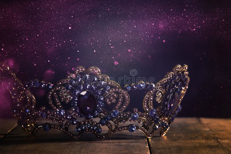 low key image of beautiful queen/king crown. fantasy medieval period. Selective focus.